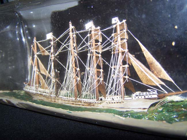 A Wondeful late 19th century sailor-made Five Masted Ship-in-a-Bottle